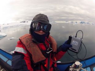 Elizabeth holding a data logger